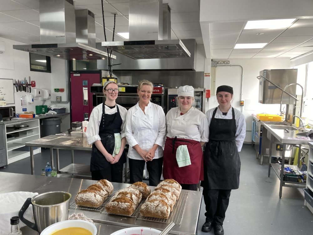 Rachel Allen with students involved in prepping and baking 