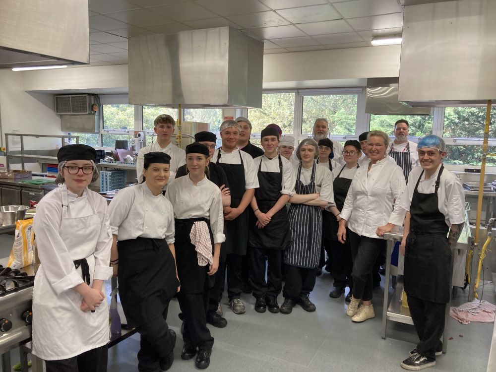 Rachel Allen with students preparing food