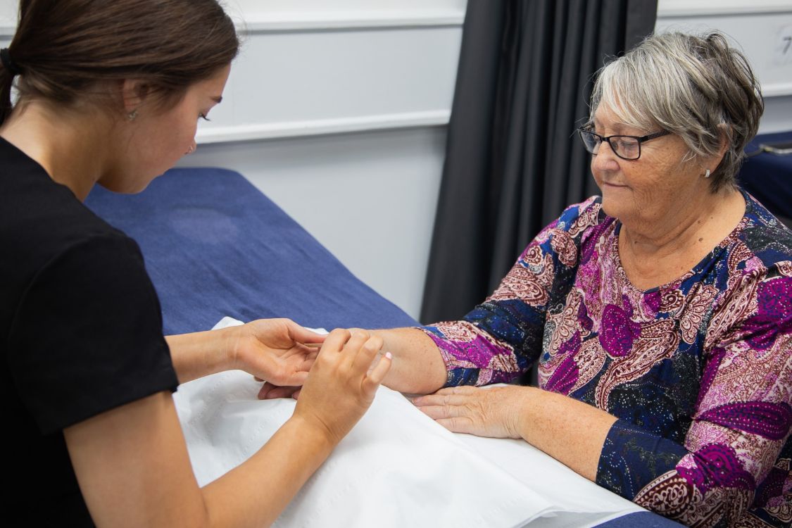 Clara Topping with a carer.