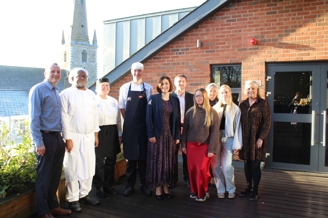 Minister with hospitality and tourism students and staff, Tommy Martin and Heather McKee 