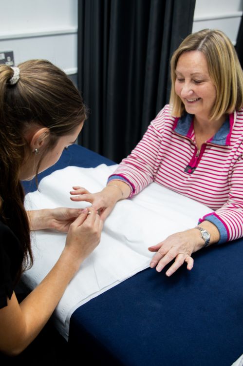 Sophie Carson with a carer.