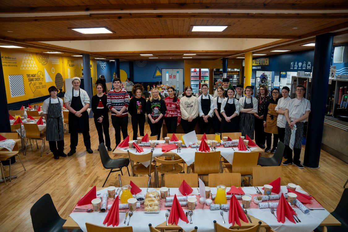 SERC students and staff ready to welcome foodbank clients to a Christmas Dinner 