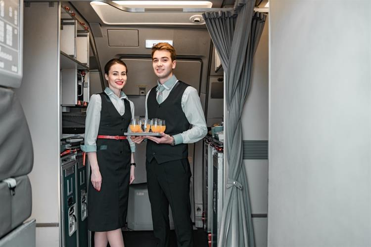 Cabin crew serving drinks