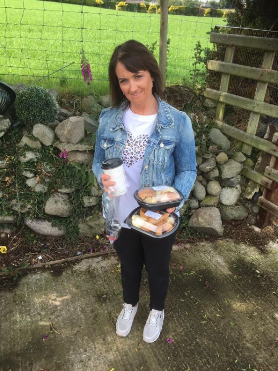 SERC Health and Social Care Lecturer, Rosie Peters (Castlewellan) preparing to deliver meals and baked treats, prepared in the College, to Golden Memories clients in Downpatrick area.