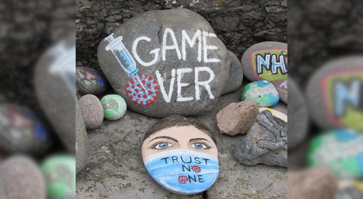 a stone with "Game over" painted across