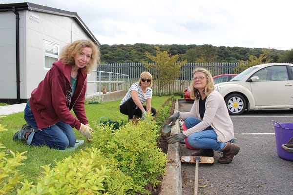 Volunteers busy planting out.