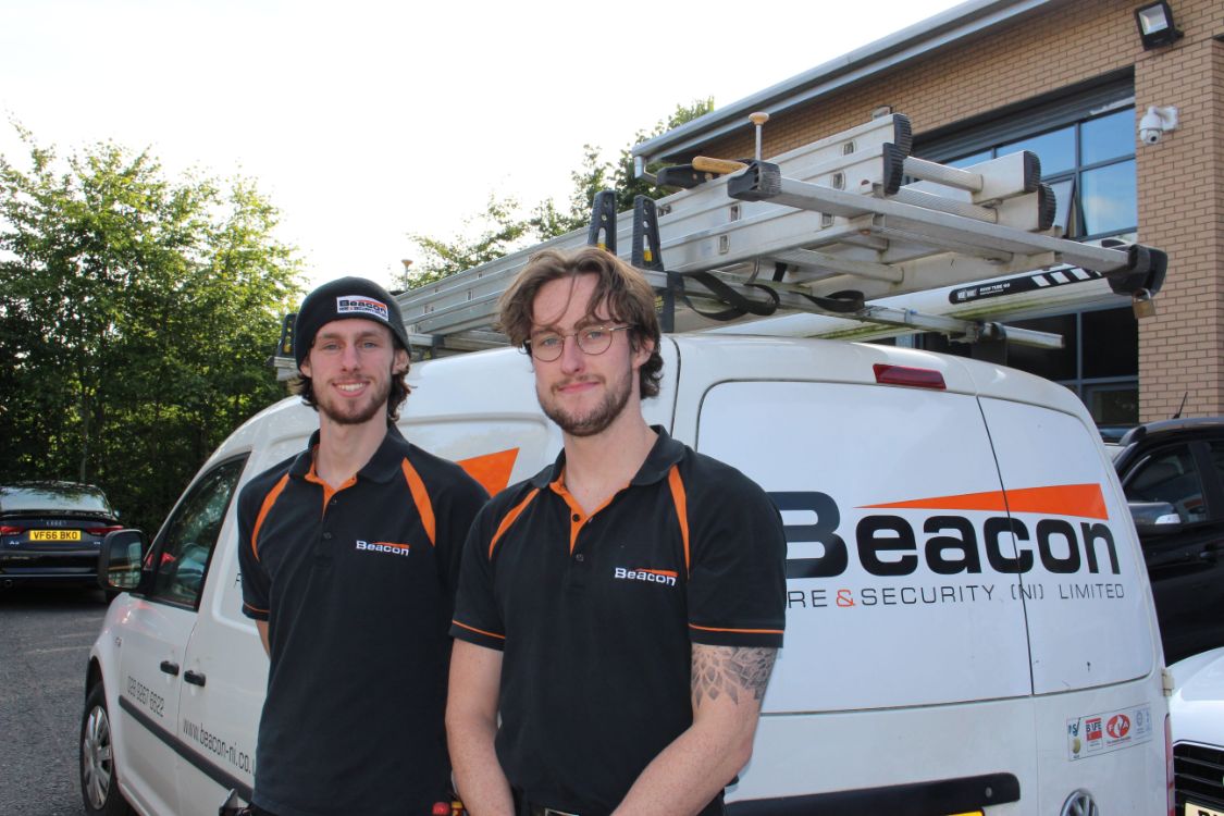 Peter and Adam Smylie pictured outside Beacon Security van