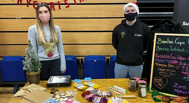 Staff behind their stall at the Christmas fairs in Bangor