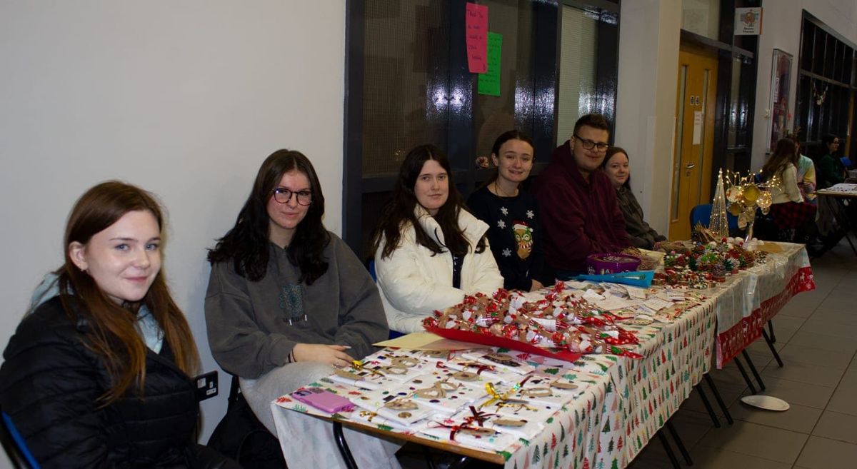 Level 3 Health and Social Care students Mia Clarke and Brooke Reynolds with Childcare Level 3 students Isabella Denny,  Sarah-Louise Rea, Kyle Fyffe-McFadden and Frayah Bourton.