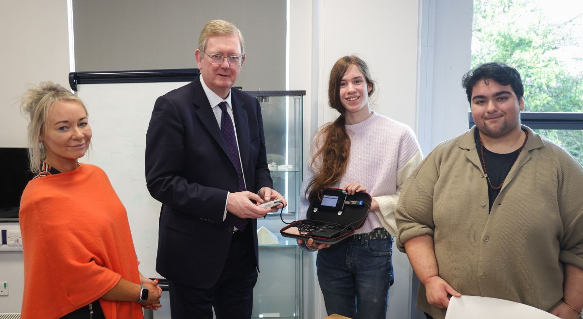 Aurla McLoughlin, Lord Caine and Level 3 IT students Finley Houston (Finnis) and Parsa Teri (Carryduff) who founded the SERC student company Future Focus Technologies, which aims to divert discarded mobile phones from landfill by repurposing them as games modules.