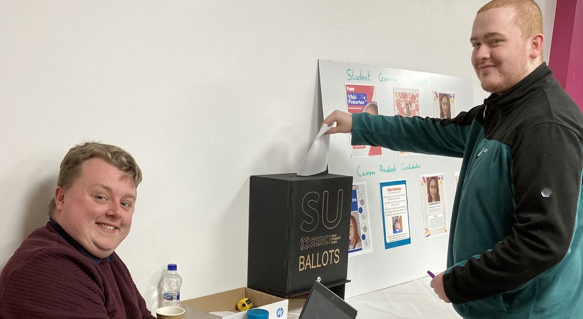 Ross Currie with student, Luc Ireland, casting his vote.