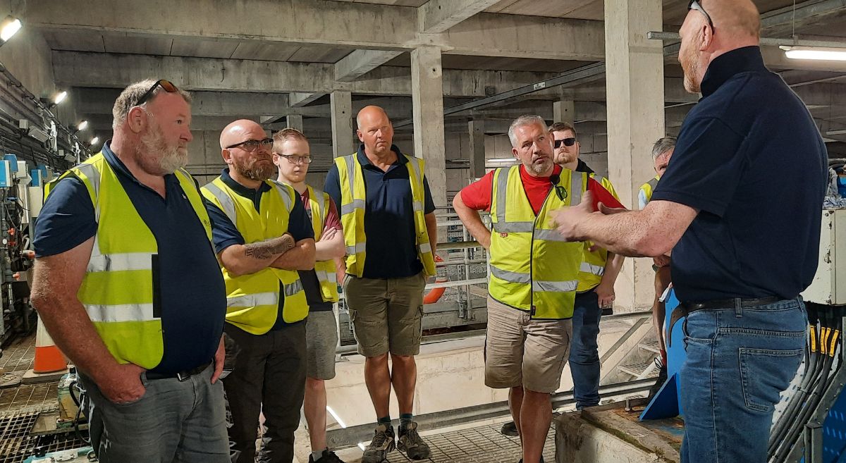 SERC staff in high viz jackets listening to Gary Presho from NI Water