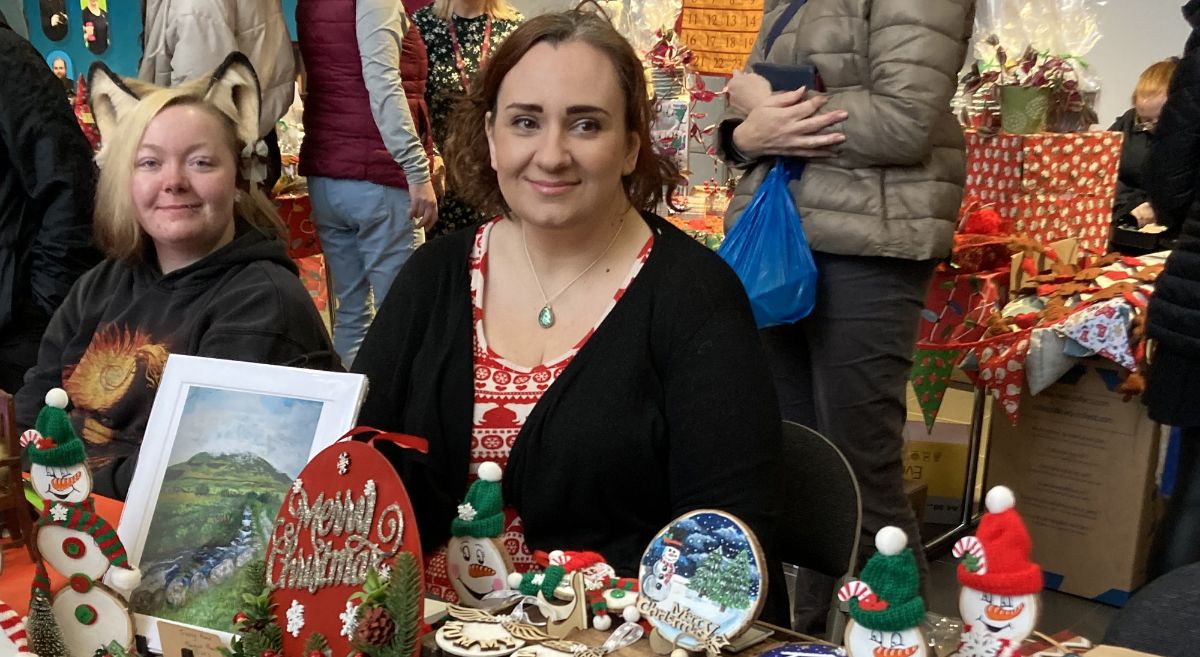 Art and design student at festive market