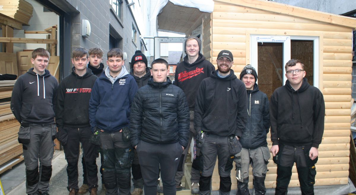 Students outside garden rooms