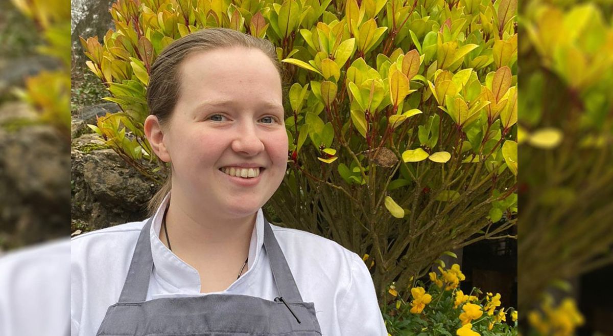 Female culinary arts student smiling to camera