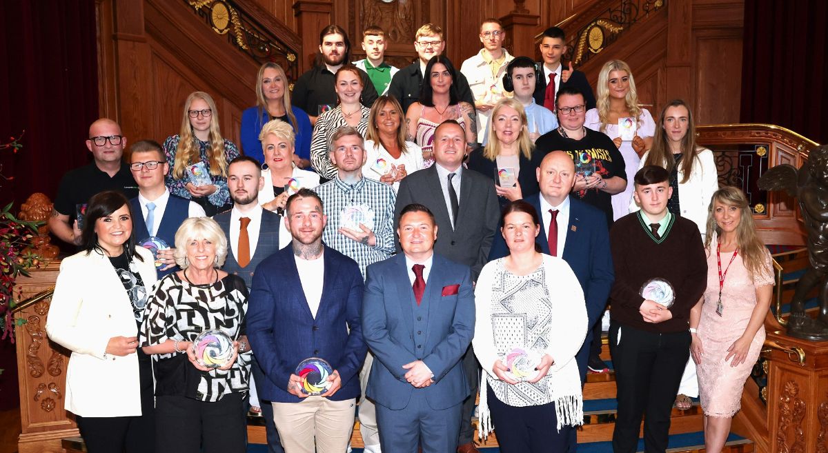 Awardees at the Grand staircase in Titanic Belfast