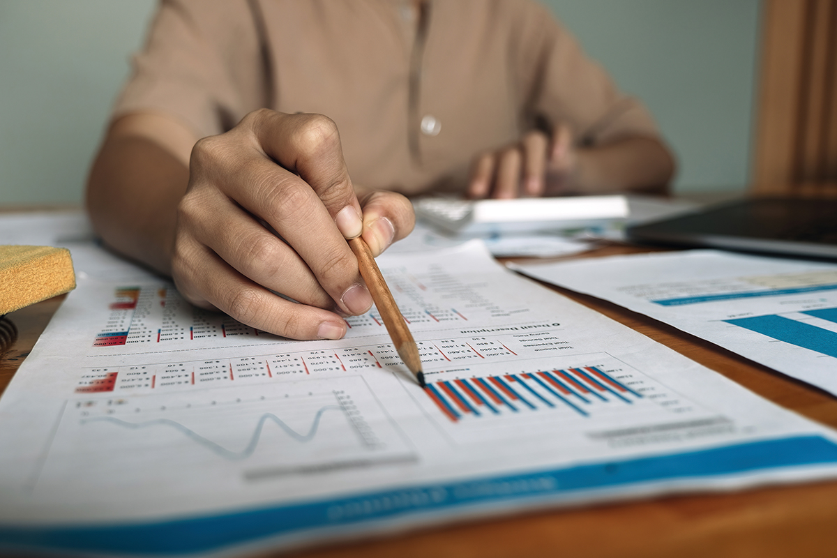 Photograph showing a man budget tracking